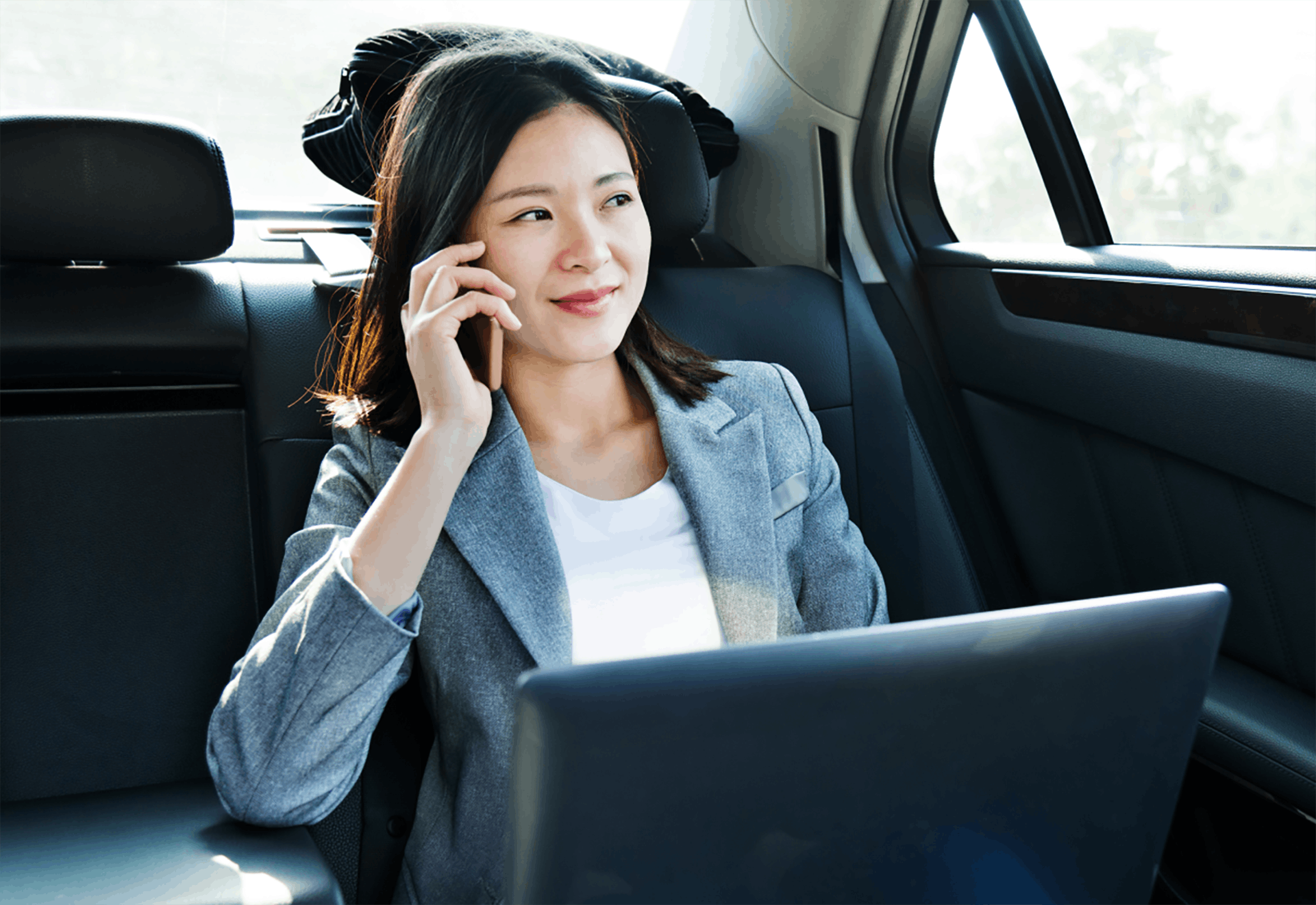 Woman talking on phone while traveling